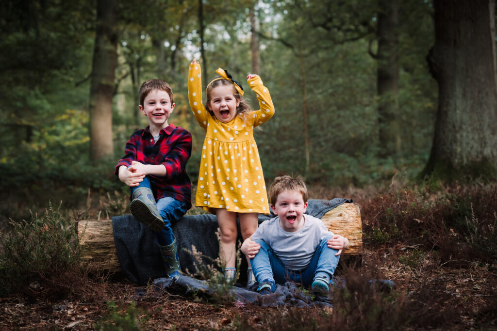 Cousins enjoying themselves during their family photography session in hertfordshire