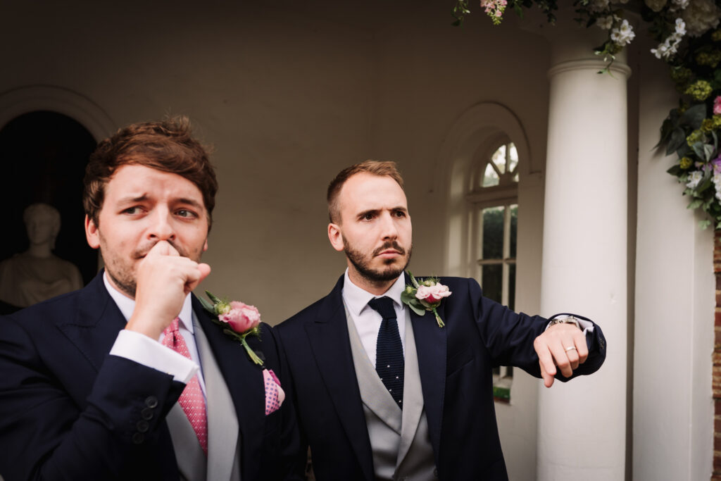 groom waits nervously for the bride at micklefield hall wedding