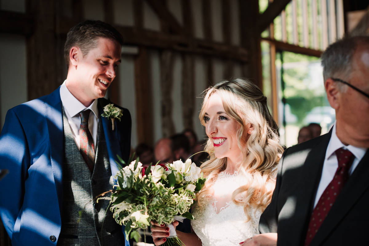 Bride arrives at the alta with her dad at rowley Barn wedding