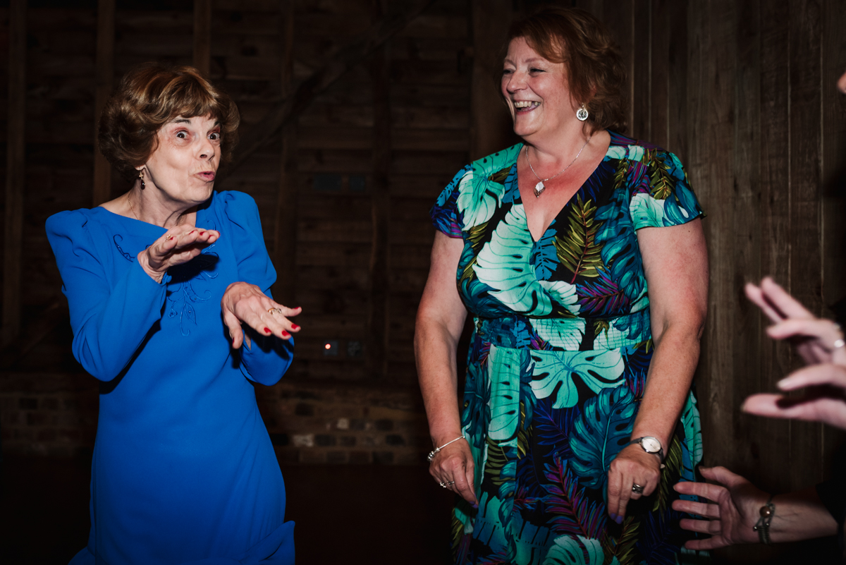 Older lady shows of her dance moves at Redcoats Farm wedding reception