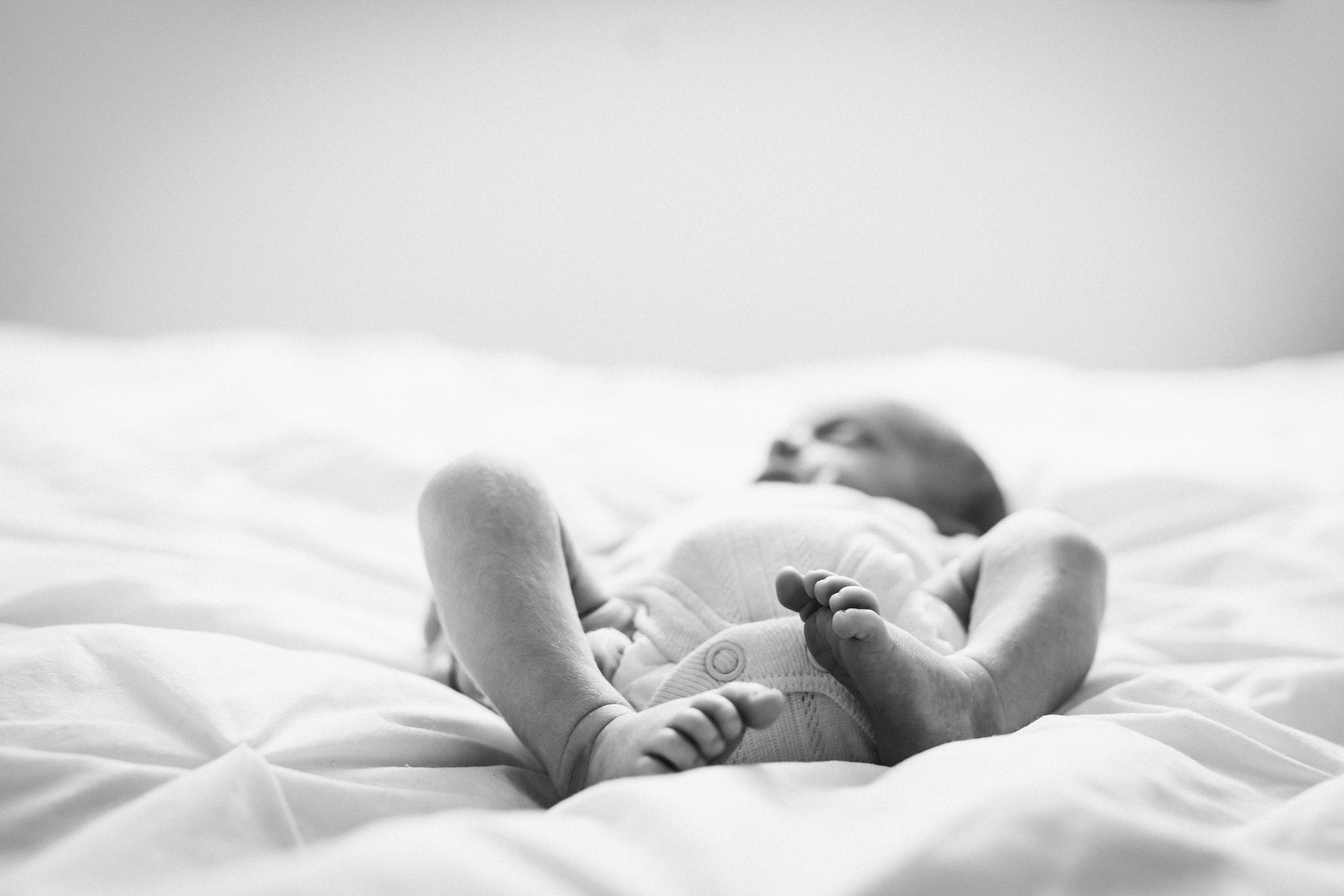 newborn photography includes pictures of tiny toes and fingers
