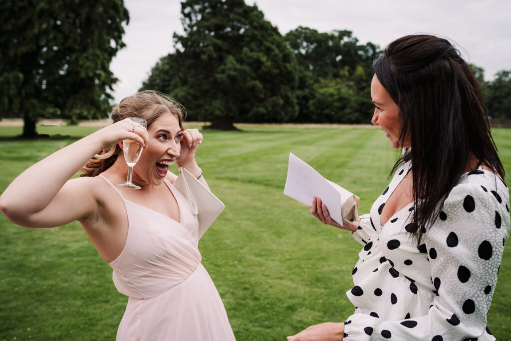 bridesmaids fools around during the Offley Place wedding reception